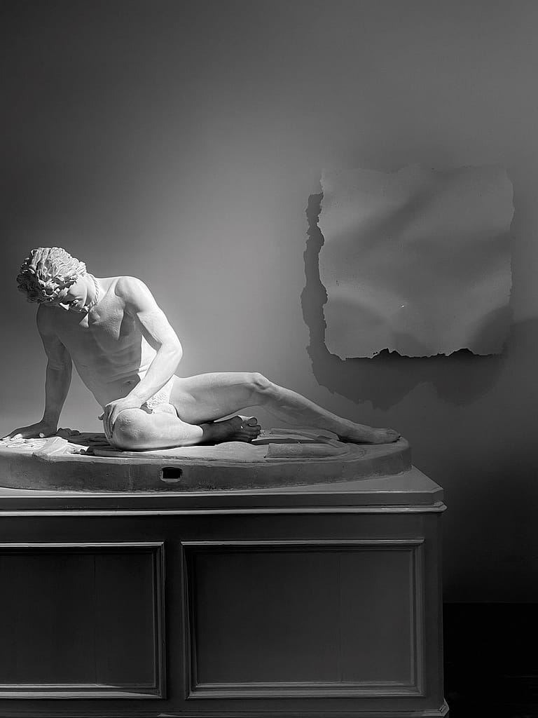 Untitled, 2023, by Sassolino, installed next to Ditta Michele Gerard (1837-1904), Dying Gaul, at the University's Valletta Campus Gibsoteka. Photo by Chiara Galea
